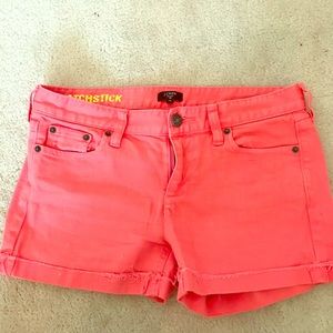 Coral J Crew distressed denim shorts